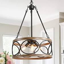 Take cues from this loftlike dining room and add warmth with exposed beams, distressed wood finishes, and textured accents. Ksana Farmhouse Drum Chandelier Modern Faux Wood Light Fixture For Dining Rooms Living Room Bedroom And Foyer Amazon Com