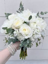 All in one registry · convenient mobile apps · customizable checklist Elegant White Bridesmaid S Bouquet Composed Of Peonies Stock Garden Roses Ranunculus And Eu White Wedding Bouquets Wedding Flowers Bridesmaid Bouquet White