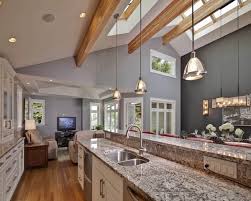 The cathedral ceiling gives this kitchen an open feeling, making it seem larger than it really is. Vaulted Ceiling Lighting Ideas Creative Lighting Solutions