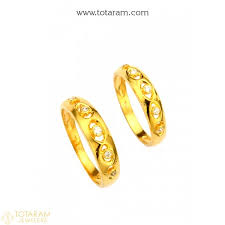 These wedding bands feature gemstones or diamonds set into the design. His Her Rings Set Gold Couple Rings Set Bridal Rings Set Indian Gold Jewelry Buy Online
