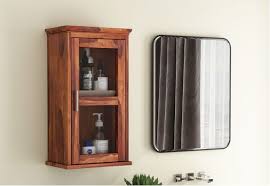 Mirrored medicine cabinets are a great option if your bathroom interior boasts glass walls or floor. Bathroom Mirror Cabinet Buy Wooden Bathroom Cabinets Online In India Upto 55 Off