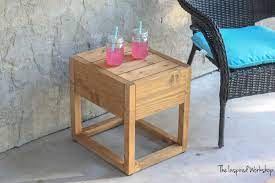 Here he is a few months ago (much smaller then) getting caught with a bone in so, a coffee table that doubles as cushion storage was born. Diy Modern Outdoor Side Table The Inspired Workshop