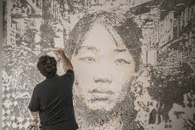 A Fearless Street Artist Carves