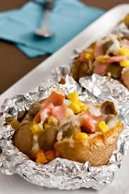 Papas al horno con mantequilla y un toque de orégano. Patatas Asadas Rellenas Receta Facil Estilo Feria Pequerecetas