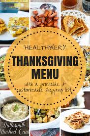 Thanksgiving dinner table with roasted whole chicken or turkey, green beans, mashed potatoes, cranberry sauce, grilled vegetables. Real Food Gluten Free Thanksgiving Menu With Shopping List