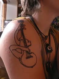 Electricatomic has uploaded 255 photos to flickr. Shel Silverstein S Guitar Tatoo