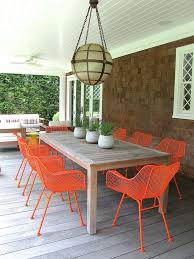 Striking Orange Outdoor Dining Chair Designed In Wire Finishing Combined Rectangular Old B Outdoor Dining Chairs Colorful Patio Furniture Modern Outdoor Dining