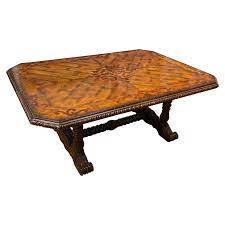 High end light wood top with stone based pedestal with decorative detail. Maitland Smith Spanish Style Coffee Table At 1stdibs