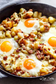 Whisking air into the eggs is one secret to a fluffy omelet. Cheesy Bacon And Egg Hash Breakfast Skillet Cafe Delites