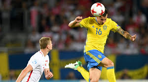 Poland's robert lewandowski, center, shoots to score past sweden's victor lindeloef and sweden's mikael lustig during the euro 2020 football. 6u87eagyyze58m