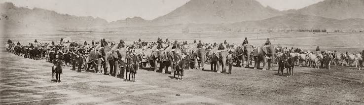 Photograph of a group of Afghan prisoners with a Sikh escort, taken by John Burke in 1878.