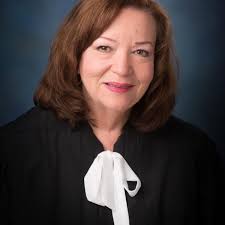Devereux, Knight putting down gavels, retiring from 22nd Judicial District  Court
