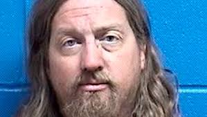 Man charged in crash denies violating deferred sentence