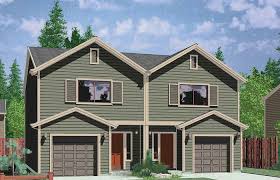 This type of home is a great option for a rental property or a possibility if family or friends plan to move in at some point. Middle Mediterranean House Plans Traditional Duplex With Garage In The Luxury Standard Open Floor Marylyonarts Club