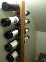 Finally My First Project Vertical Wine Rack By Flowchart Jockey Lumberjocks Com Woodworking Community A vertical stack of three evenly spaced horizontal lines.