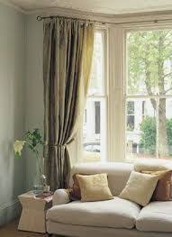 Bay window curtain pole ideas small details with great visual eal. The Most Effective Solutions To Your Bay Window Curtains Window Treatments Living Room Curtains Living Room Living Room Windows