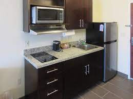 A toaster, coffeemaker, cooking utensils, pots and pans, dishes and silverware are available upon request. Furnished Kitchenettes In Every Room Picture Of Suburban Extended Stay Hotel Donaldsonville Tripadvisor