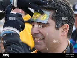 Pittsburgh Steelers' fan Randy DeMars, from Troy, N'Y. gets a "Steelrs"  logo painted