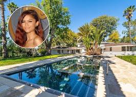 Celebrity Homes In April 2020 Zendaya Buys In La Pharrell Sells His Mega Mansion Celebrity Houses Mega Mansions Zendaya House