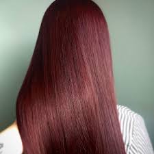 With a dash of red hair and the rest of her hair left dark. 6 Cherry Red Hair Ideas Ripe For Picking Wella Professionals