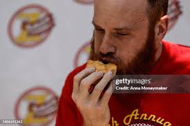 56 Independence Burger Eating Championship Stock Photos, High-Res Pictures,  and Images