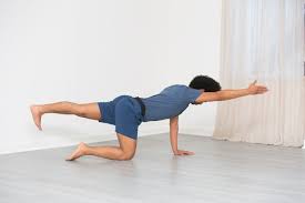 Learn Simple Exercises You Can Do To Lengthen Your Spine And Find Relief Kyphosis Exercises All Yoga Poses Exercise