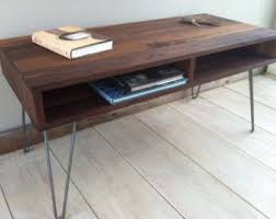 We've already told you of retro chairs and sofas, and now it's time to have a look at the coffee tables. Mid Century Modern On Etsy A Global Handmade And Vintage Marketplace Mid Century Modern Coffee Table Coffee Table Living Room Decor Fireplace