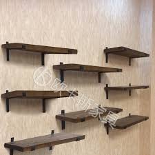 Install wall mounted shoe racks to the back wall of your closet. Usd 15 71 Simple Shoe Store Shelf Display Cabinet Solid Wood Wall Shoe Rack Shoe Rack Wall Mounted Children S Shoe Rack Shoe Support Bag Rack Hat Rack Wholesale From China Online Shopping