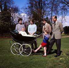 The Queen's family in photos, from meeting her first grandchild to laughing  with Prince Harry