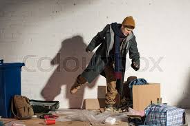 Büromaterial, schreibwaren, lehrmittel und mehr. Angry Homeless Man Kicking Cardboard Stock Image Colourbox