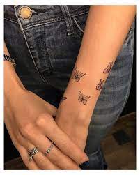 15 Small Simple Butterfly Tattoo Ideas Cool Girl Tattoos Coolgirltattoos Butterfly Tattoos Are Beautiful Trend Simplistic Tattoos Dainty Tattoos Tattoos