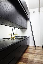 A Glamorous Bachelor Pad In Australia Small Space Edition Remodelista Black Marble Countertops Outdoor Kitchen Design Home
