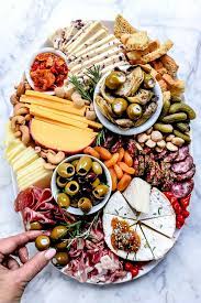 How To Make An Instagram Worthy Charcuterie Board Foodiecrush Com Party Food Appetizers Food Platters Charcuterie And Cheese Board