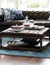 Adding a coffee table to your living room will not only give you a spot to put your drink, rest your feet, or store some magazines, it will also tie the room together and give it a polished look. 13 Soft Top Coffee Table With Storage Ideas Coffee Table With Storage Coffee Table Ottoman Coffee Table