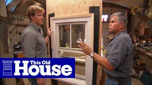 Before applying the grout, liberally brush water onto the exposed concrete foundation around the bulkhead opening. How To Flash A Window This Old House Youtube