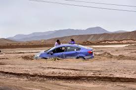 Vivid colors belie the arid landscape of northern chile where the atacama desert, one of the world's driest, meets the foothills of the andes. World S Driest Desert Floods As Extreme Weather Events Rise Bloomberg