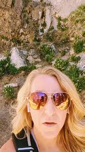 I'm sweating and trying to catch my breath at the top of Mary Jane Falls. I  almost tripped