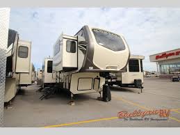 Toy hauler travel trailer travel trailer truck camper. Spacious Living In The Keystone Montana 3730fl Fifth Wheel With Six Slides Bullyan Rvs Blog