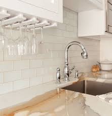 White Glass Subway Tile As Backsplash Stemware Holders On The Underside Of T White Subway Tile Kitchen Subway Tile Backsplash Kitchen Kitchen Tiles Backsplash