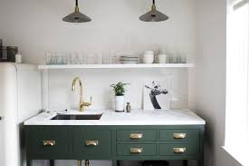 White acrylic kitchen sink drop in for 30 seconds cleaner home. Remodeling 101 What To Know About Choosing The Right Size Kitchen Sink Remodelista