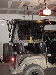 The most expensive part was the hand crank, which my wife can use, which is a crank that i bought new from the hardware store for $14 dollars and the rest for rope and pullies. Diy Hardtop Hoist System Jeepforum Com