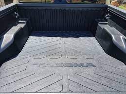 This bed mat is a heavy duty nonskid rug that drops right into my 2016 tacoma truckbed. Bed Mat Stays Tacoma World