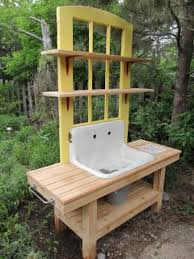 Potting Bench With Old Sink And Door Love The Shelves But Maybe A Cupboard Raised Garden Beds Diy Garden Sink Potting Bench
