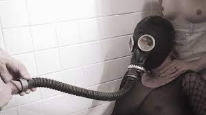 Kinky Dia Zerva is wearing a mask and gets piss from cock through the tube  - CinemaPee.com