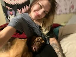 This is our pretty girl skeeter. And a Wild bunny who i was rehabilitating  who loved to sit with her.