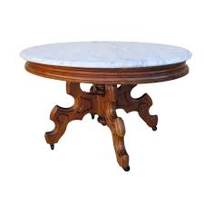 You can find examples for a few hundred dollars, such as this vintage art deco cast iron and marble table on etsy. Antique Victorian Marble Top Coffee Table Antique Furniture Marble Top Coffee Table Antique Coffee Tables Marble Coffee Table