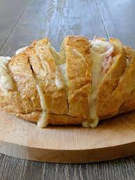 Brush the sides and the bottom of the. Stuffed Bread Loaf Food Cooking Recipes Recipes