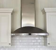 In the kitchen of the kuppersmith project house, a glass tile backsplash was applied to the wall behind the stove. Isabella Max Rooms All S Well That Ends Well Kitchen Redesign Lake House Kitchen Kitchen Plans