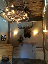 Elk Antler Wagon Wheel Chandelier Custom Made For Ernie S Steakhouse 41 Club In Lewiston Id By My Boyfr Lodge Lighting Antler Light Fixtures Antler Lights
