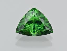 The Triangle Shape Of This Zircon Highlights Its Striking Green Color In 2020 Gemstones Crystals And Gemstones Zircon